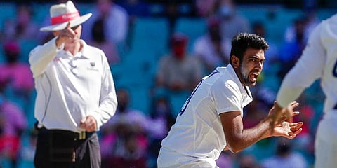 R Ashwin celebrates as umpire signals the dismissal of David Warner during play on day three of the third Test at Sydney. (Photo | AP)