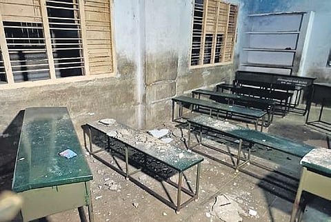 The classroom beneath the collpased ceiling in Vedasandur Government Higher Secondary School in Dindigul district. (Photo| EPS)