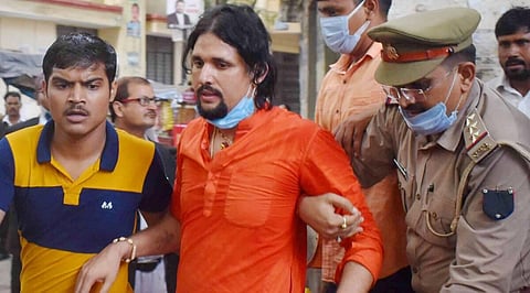 Anand Giri, the prime accused in the Mahant Narendra Giri death case, outside the district court in Prayagraj. (File Photo | PTI)