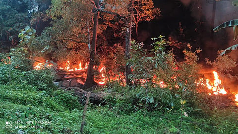 The tanker which overturned and caught fire at Arbail Ghat (Photo | Special arrangement)