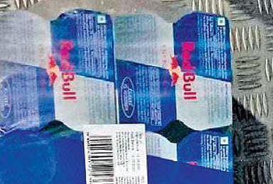 The security staffer assumed that  the cans were filled with alcohol 