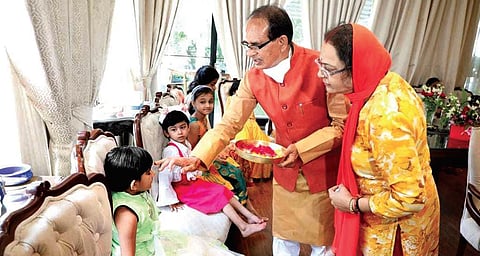 MP CM and his wife perform Kanya Pujan at their residence on Bhopal | EXPRESS
