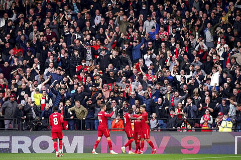 Liverpool's Roberto Firmino, right, celebrates after scoring goal during Premier League match against Watford at Vicarage Road, Watford, England, Saturday. (Photo | AP)