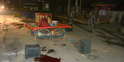 Blood stains and slipper at the spot where militants shot dead a non-local Arbind Kumar, at Eidgah in Srinagar. (Photo| PTI)