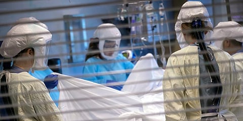 Medical professionals look after a COVID-19 patient in the ICU in Salt Lake City. (Photo | AP)