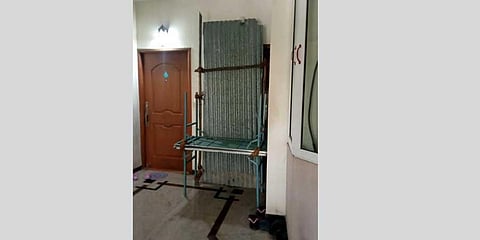 The  entrance of a house in an apartment that was sealed to prevent the contacts of the positive patient from venturing out | EXPRESS