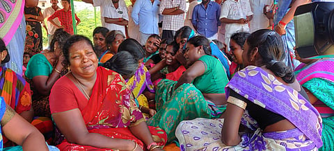 The family of Rajkiran, who died on Monday, sit in protest at Kottaipattinam, Pudukkottai on Friday (Photo | Express)