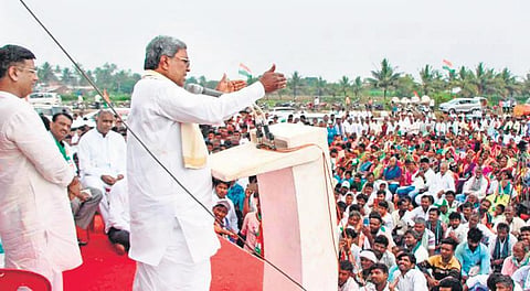 Congress leader Siddaramaiah campaigns for party candidate Srinivas V Mane in Hanagal taluk on Saturday | Express