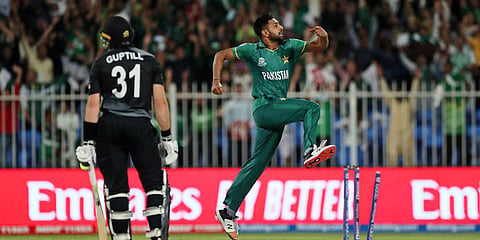 Pakistan's Haris Rauf celebrates the dismissal of New Zealand's Martin Guptill during the T20 World Cup match in Sharjah. (Photo| ANI)