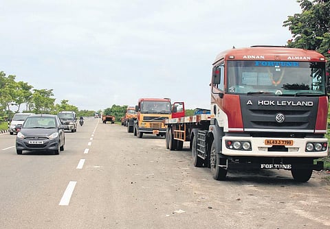 Trucks parked along the Container Road stretch