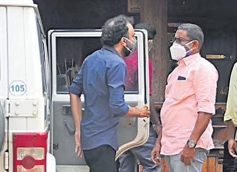 Monson Mavunkal being brought to his residence in Kochi for evidence collection in connection with a cheating case on Tuesday | A Sanesh