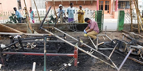 Personnel collecting samples from under the Thennur bridge on Thursday. (Photo | MK Ashok Kumar, EPS)