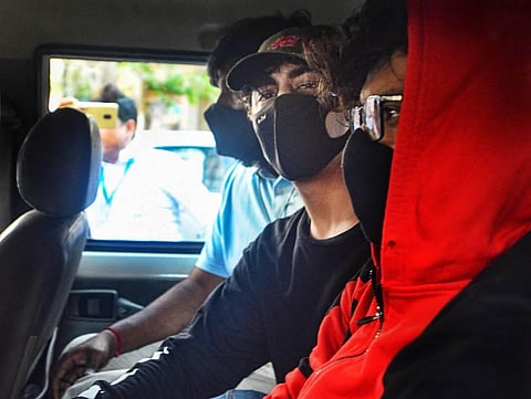 Bollywood actor Shahrukh Khan's son Aryan Khan being taken for his medical examination by NCB officials in connection with allegedly a drugs case. (Photo | PTI)