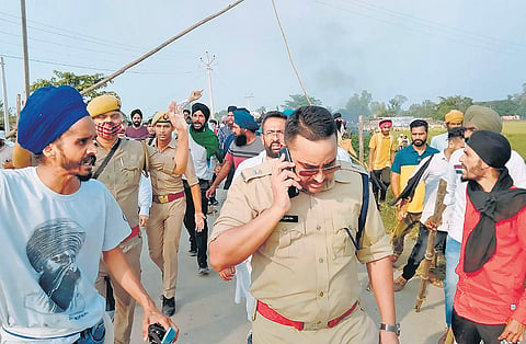 Agitated farmers take to streets after protesters were run over by SUVs in Uttar Pradesh’s Lakhimpur Kheri on Sunday | pTI