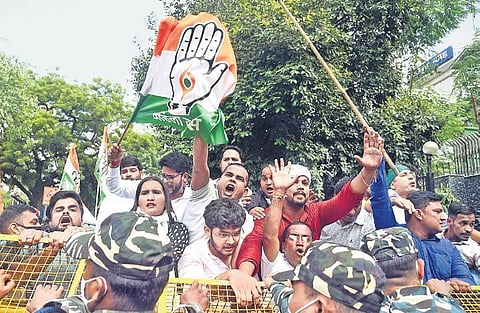 Mahila Congress and Indian Youth Congress members stage protest over Lakhimpur Kheri incident at UP Bhavan in New Delhi on Monday | Parveen negi