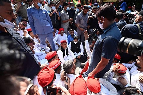 Akhilesh Yadav sits on a dharna against the Lakhimpur Kheri incident that killed at least nine people. (Photo | Akhilesh Yadav, Twitter)