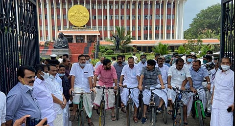 UDF MLAs arrived and left the Assembly on bicycles as a mark of protest against the rising fuel prices (Photo | EPS)
