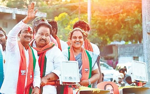 BJP candidate Eatala Rajender waves to the crowd during his poll campaign in Ellandakunta mandal (File photo)