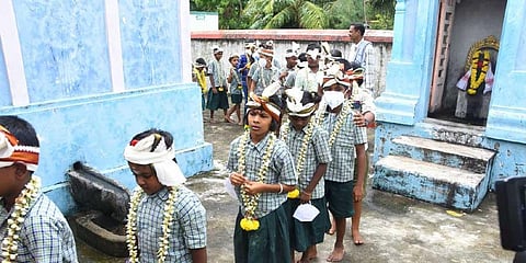 Students of government primary school in Ramagovindankadu were all honoured with the traditional headband on Monday | Express