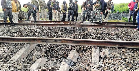 Security personnel inspect the explosion site in Jharkhand | Express