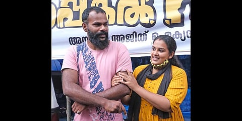 Anupama S Chandran and Ajith Kumar sharing their happiness at the protest venue after the DNA test revealed that they were the biological parents of the baby. (Photo |Vincent Pulickal)
