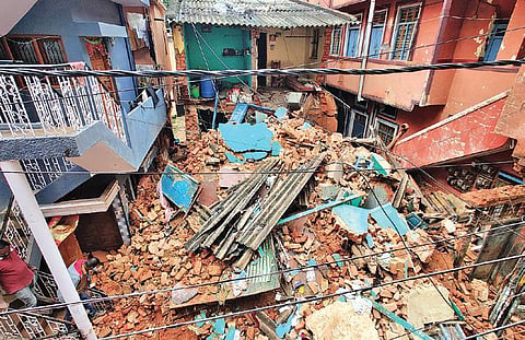 The remains of the 58-year-old two-storeyed building that collapsed on Milkman Street in Ulsoor. (File photo| Ashishkrishna HP, EPS)