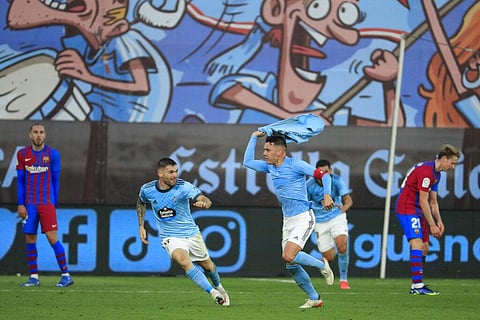 Celta Vigo's Iago Aspas, 3rd left, celebrates after scoring his side's third goal during La Liga match against Barcelona at the Balaidos stadium in Vigo, Spain, Saturday. (Photo | AP)
