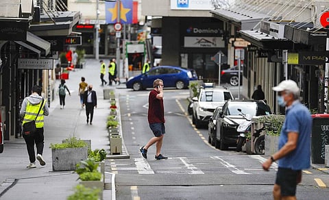 People walk through central Auckland, New Zealand, Monday, Nov. 8, 2021. (Photo | AP)