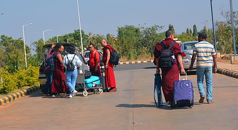 Air passengers are catching a taxi at Hubballi Airport. (Photo | D Hemanth, EPS)