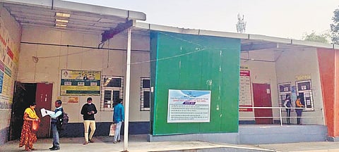 The District Registrar- cum-Counselling  Centre in Patna;  (right) applicants filling  up forms to avail  of education loan.