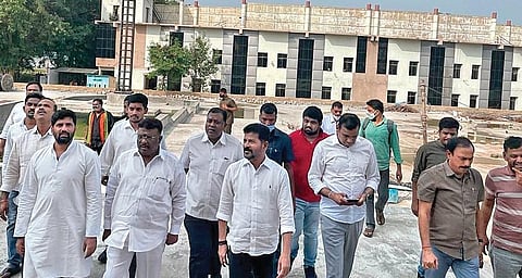 TPCC chief Revanth Reddy, along with Congress leaders, at the Martyrs Memorial, under construction  near the Tank Bund in Hyderabad on Saturday | RVK Rao