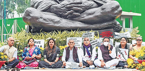 FILE | Suspended Rajya Sabha MPs stage dharna demanding revocation of their suspension in Parliament. (Photo | PTI)