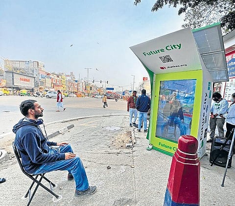 A person using the Future City installation.