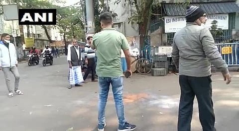 Crude bomb hurled outside a polling booth- Taki Boys School. (Photo | Twitter/ANI)