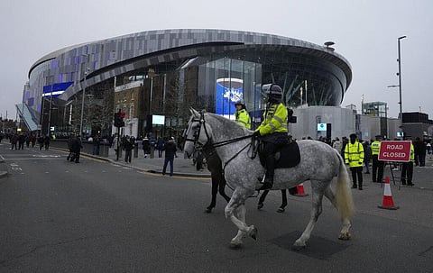 Police officers patrol outside of the Tottenham Hotspur Stadium ahead of the English Premier League soccer match between Tottenham Hotspur and Liverpool in London. (Photo | AP)