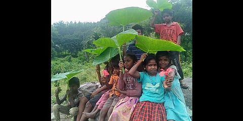 Children pose for a photo | Express
