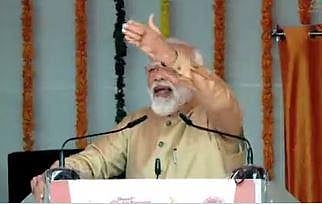 PM Narendra Modi speaking during a programme in UP's Prayagraj. (Photo | EPS)