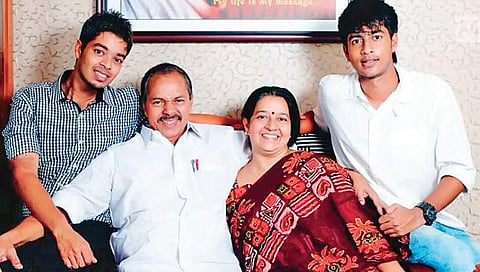 A family man, P T Thomas with wife Uma and sons