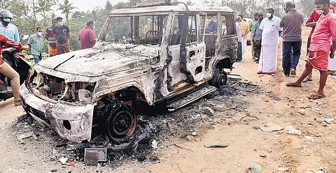 A police jeep that was set on fire by migrant workers in Kizhakkambalam on Saturday night, Dec 25, 2021. Twenty-four people have been arrested. (Photo | A Sanesh)