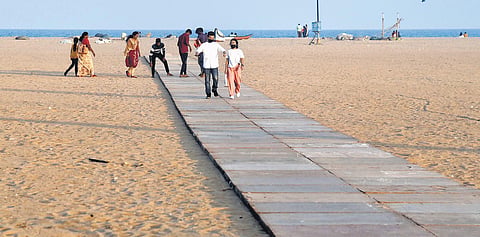 The temporary ramp made of wood laid on the Marina Beach for persons with disabilities (Photo | Martin Louis)