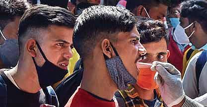 A man gives his sample at KSR Railway Station in Bengaluru | Vinod Kumar T