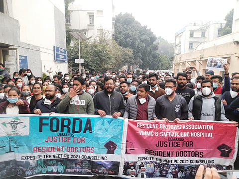 Resident doctors Protesting at Safdarjung hospital in New Delhi on Tuesday. (Express Photo | Shekhar Yadav)