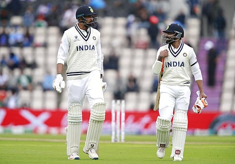 India's Ravindra Jadeja, right, and Ishant Sharma walk off the field for lunch during the third day of the World Test Championship final cricket match against New Zealand  (Photo | AP)