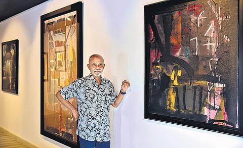 Prabhakar Kolte and his artworks.