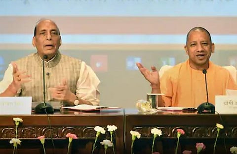 BJP leaders Rajnath Singh and Yogi Adityanath (Photo | PTI)