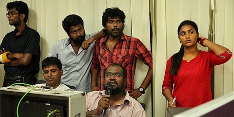 Shakthi Mahendra with director Nelson Venkatesan