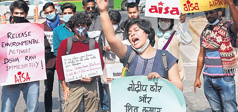 AISA members protest demanding the release of activists Nodeep Kaur, Shiv Kumar and Disha Ravi in New Delhi on Monday | Shekhar yadav