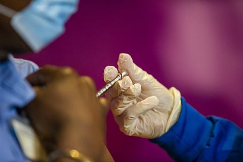 A does of COVID-19 vaccine being administered. (Photo| AFP)