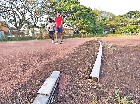 The worn-out synthetic tracks at Maharaja’s College ground | A SANESH