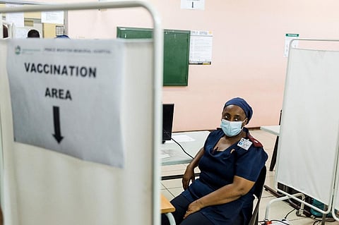 A nurse awaits to receive a dose of the Johnson & Johnson vaccine against the COVID-19 coronavirus. (Photo | AFP)